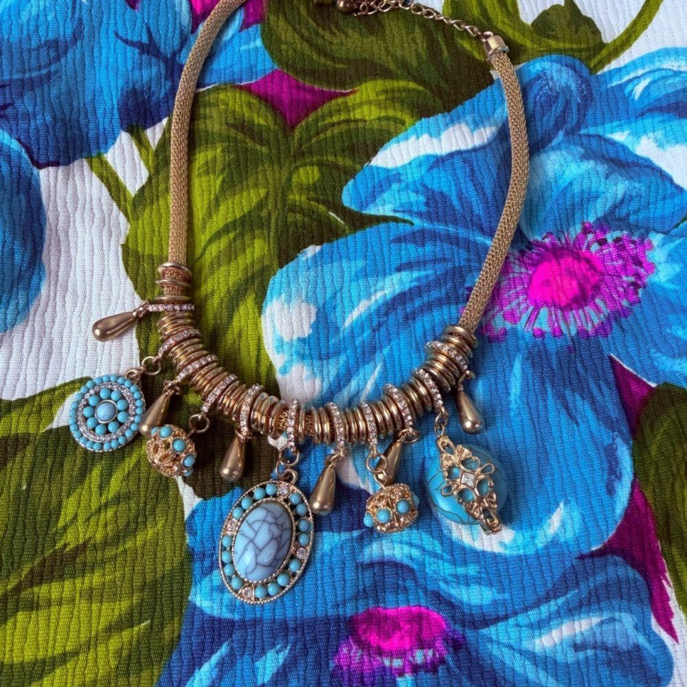 Vintage gold-tone necklace with charm slides and unique chain. Adjustable; measu